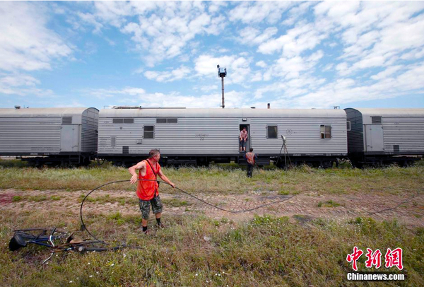 馬航遇難乘客遺體將運(yùn)至秘密地點(diǎn)2