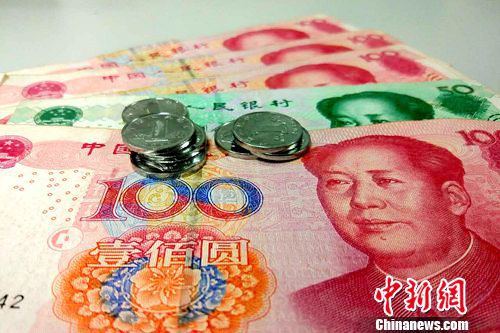 資料圖：人民幣。<a target='_blank' href='http://www.chinanews.com/' _fcksavedurl='http://www.chinanews.com/' ></table>中新網</a>記者 李金磊 攝