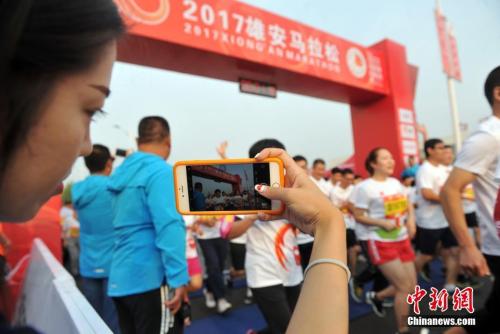 9月24日，首屆雄安馬拉松正是鳴槍開賽。<a target='_blank' href='http://www.chinanews.com/'>中新社</a>記者 韓冰 攝