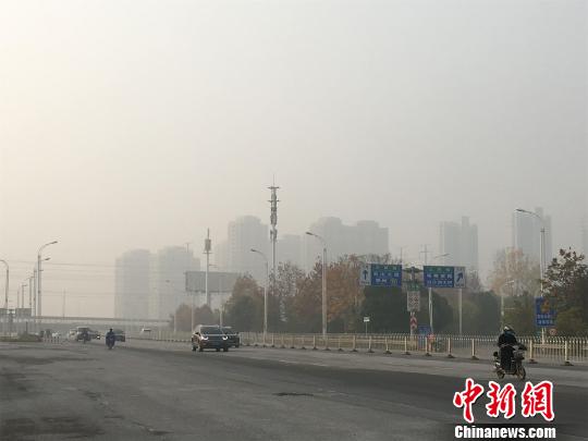 空氣污染持續湖北連續兩天拉響霾黃色預警（圖）