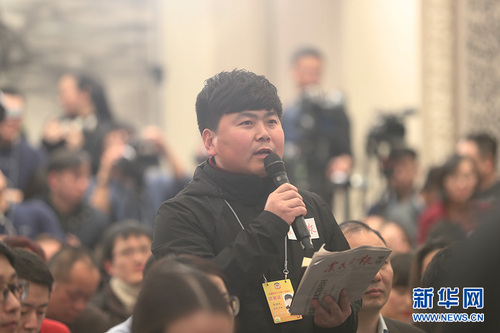 圖為農民日報記者提問